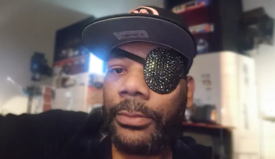 Patient wearing eye patch