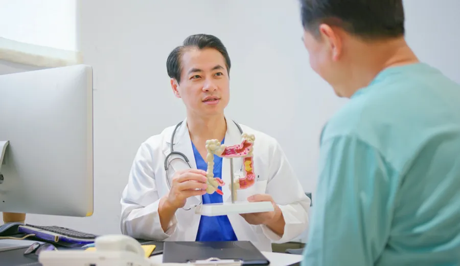 Doctor explaining colonoscopy to a patient