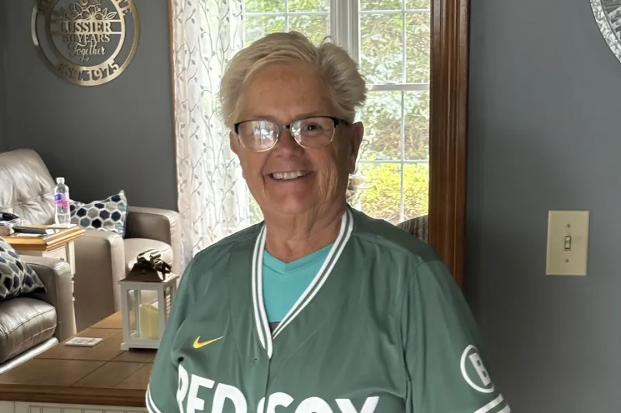 Joette Lussier at home in a Red Sox jersey