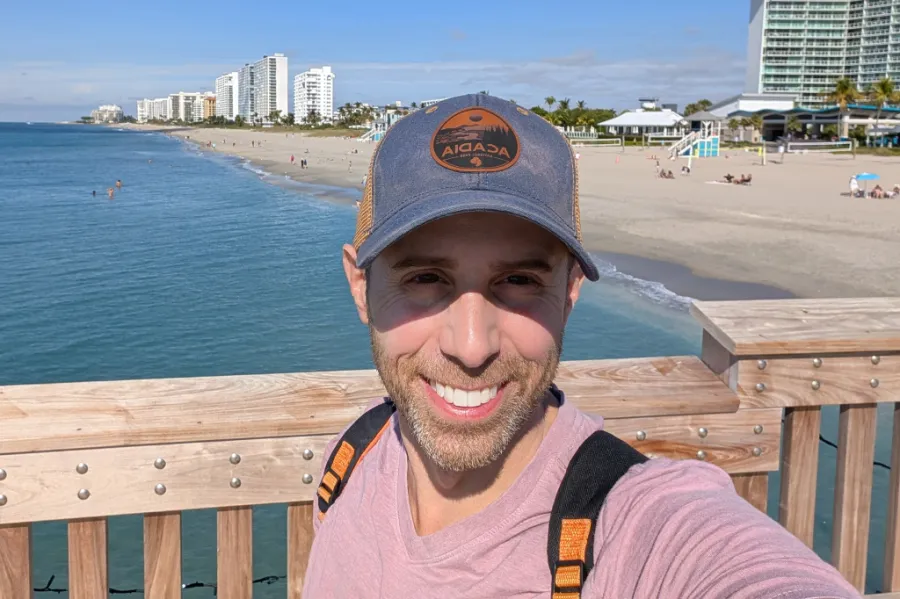 Bryan Licciardi on a pier at the beach
