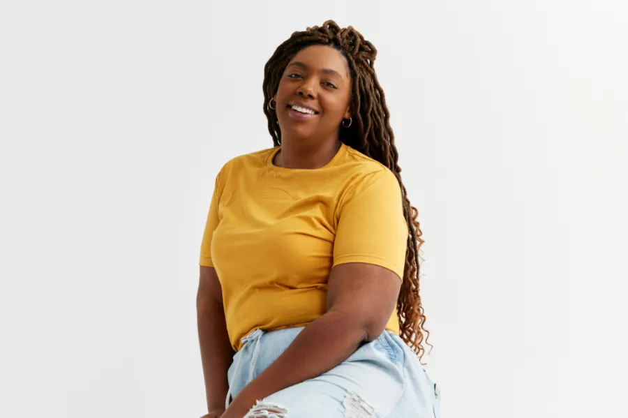 A smiling woman with long hair