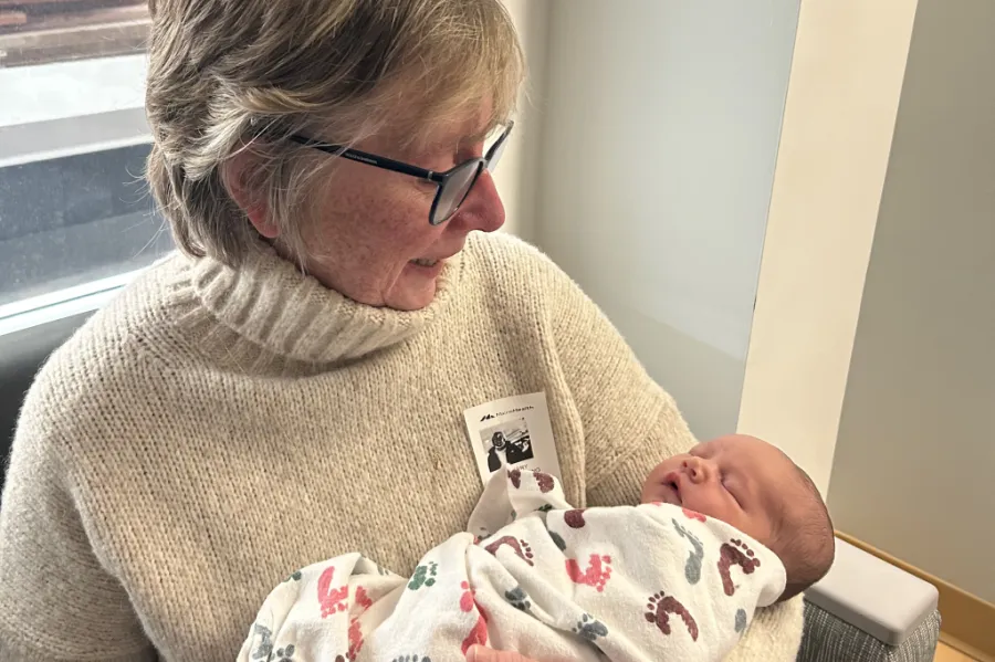 Nurse Kerry King with her grandchild