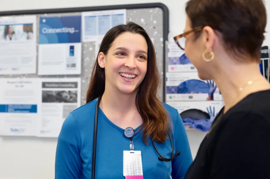 Tufts Medicine Primary Care provider speaking with a patient