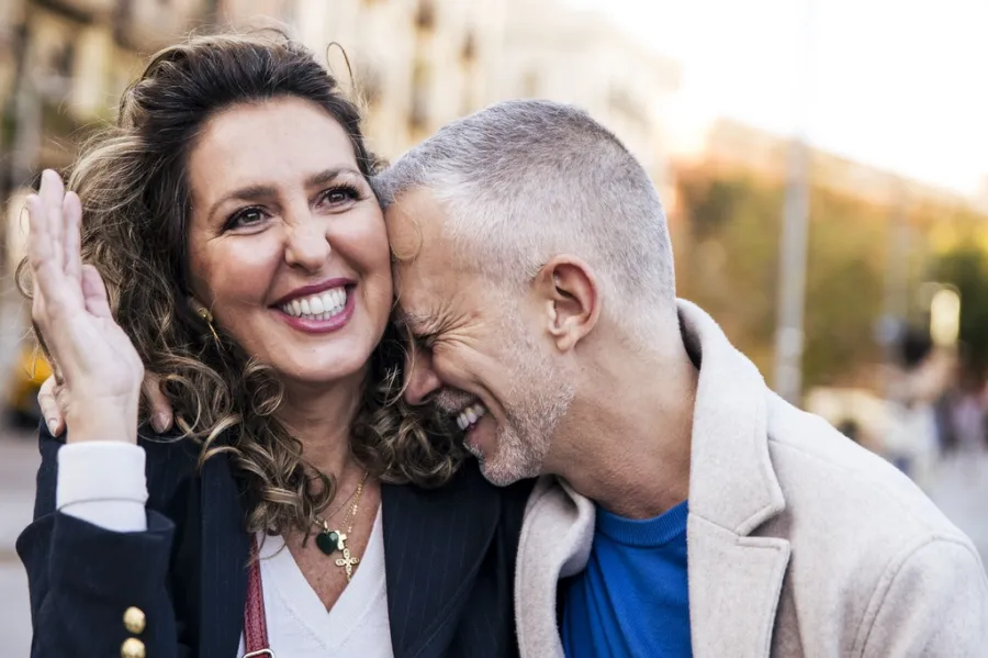 a couple laughing together