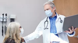 Doctor talking with a patient