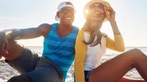 Two people enjoying the sun