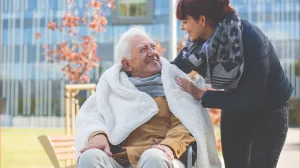 Older man with caregiver
