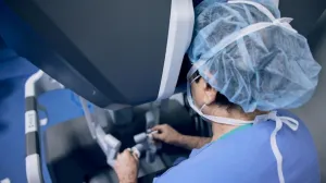 Clinician at robotic surgery