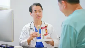 Doctor explaining colonoscopy to a patient