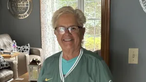 Joette Lussier at home in a Red Sox jersey