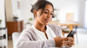 Woman looking at a mobile phone
