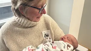 Nurse Kerry King with her grandchild
