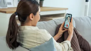 Pregnant patient speaking with a prenatal care provider during a first prenatal appointment