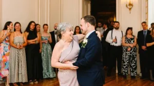Sandy dancing with her son at his wedding