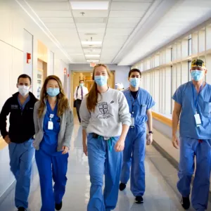 Doctors walking through the hallway