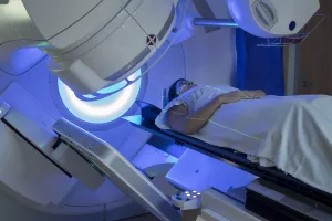 Patient receiving a minimal radiation treatment during an appointment.