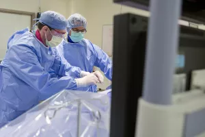 Followup biopsy procedure on heart transplant patient in the Cath Lab at Tufts Medical Center by attending physician, Navin Kapur, MD and Colin Hirst, MD.