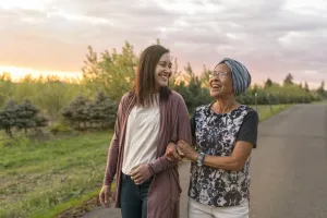 Mother and daughter walking