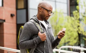Man looking at mobile device