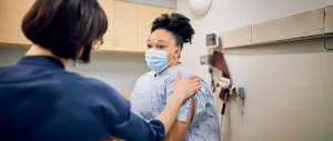 Doctor talking with a patient