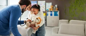Tufts Medicine Pediatrics - Doctor, child and mother