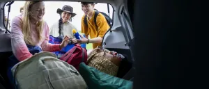 Family loading up a car