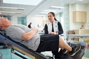 Physical Therapist, Andrea Sadler, working with patient on knee pain at the MelroseWakefield Hospital 888 Main rehabilitation office.