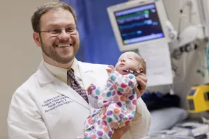Doctor with infant