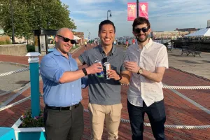 Three men standing for a photo