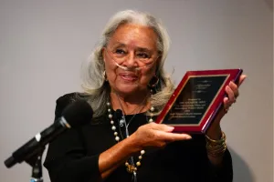 Bridging Collaborations Across the Lifespan Summit Vivian Pinn holding award