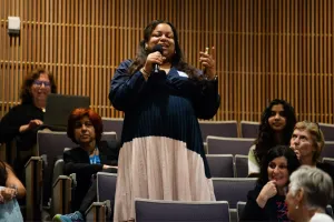 bridging collaborations across the lifespan summit woman speaking from audience