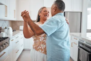Couple dancing in kitchen