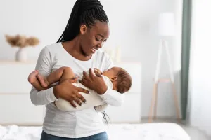 woman holding an infant